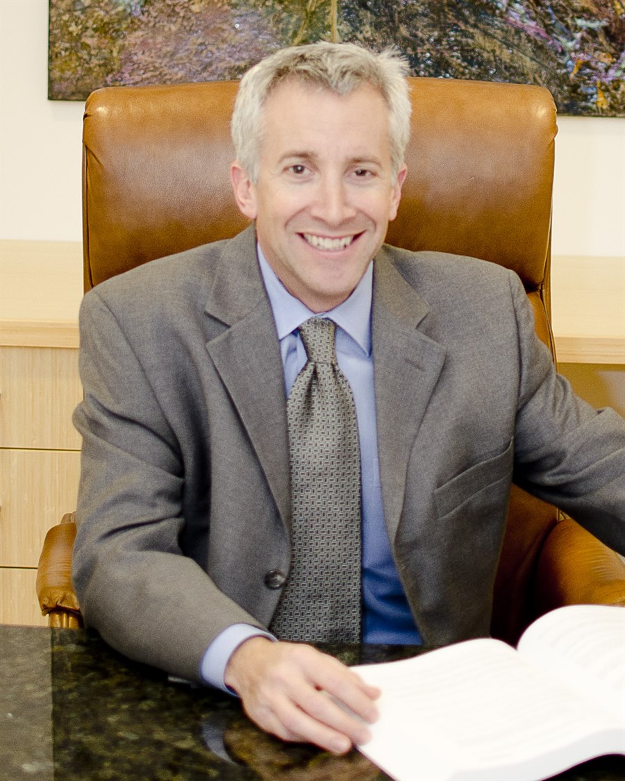 Derek B. Simms, founding attorney of Simms & Associates, in his Birmingham office